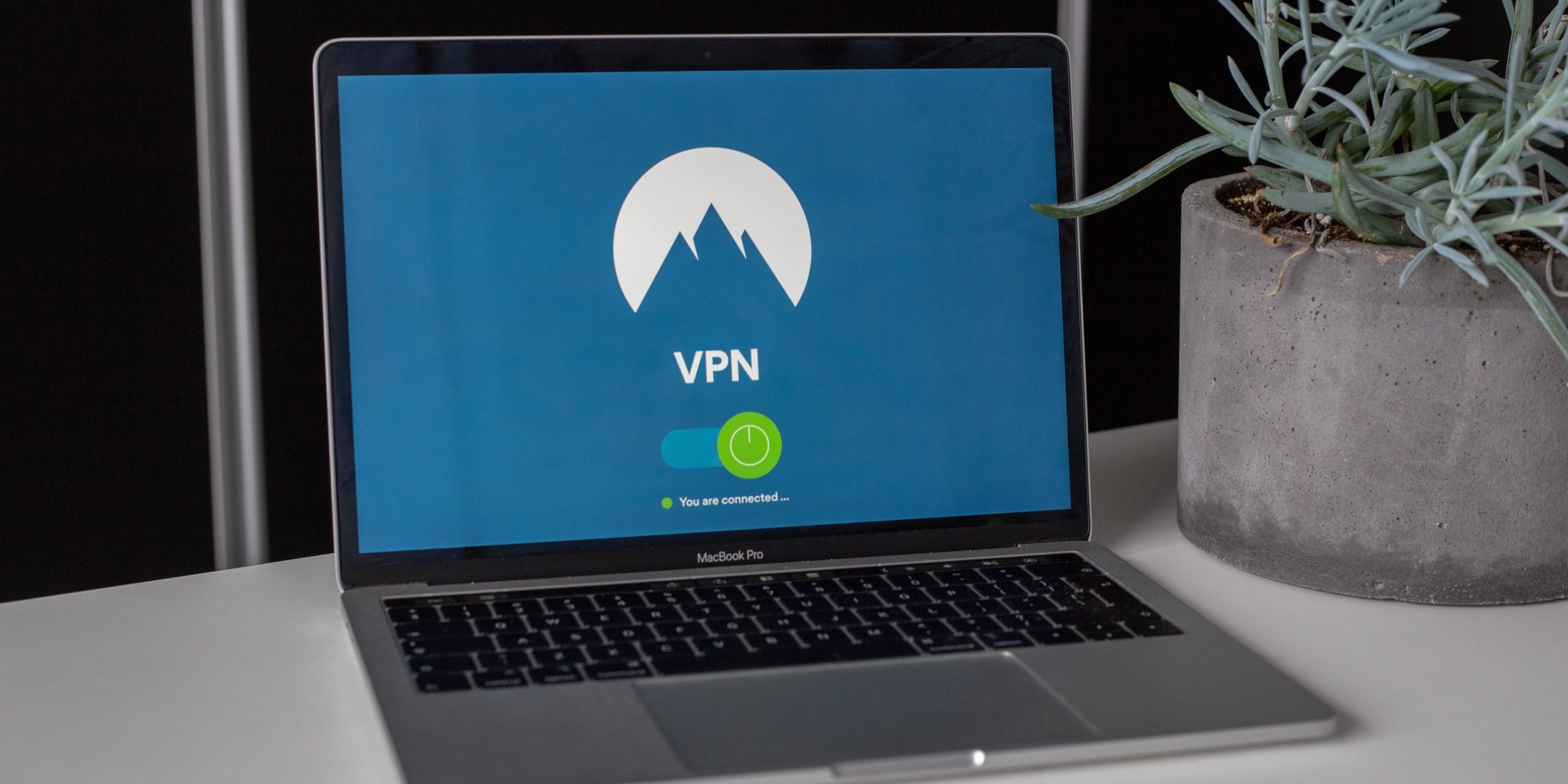 grey and black macbook pro showing vpn 2064586 scaled